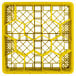 A yellow plastic Vollrath Traex glass rack with compartments.