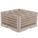A beige plastic Vollrath Traex glass rack with twelve compartments.