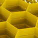 A yellow Vollrath Traex glass rack with open rack extender on top.