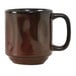 A brown Tuxton China mug with a handle.