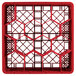 A red Vollrath Traex glass rack with hexagon compartments.