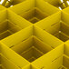 A yellow Vollrath glass rack with square compartments.