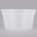 A white plastic Pactiv deli container with a lid.