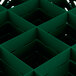 A green plastic Vollrath Traex glass rack with square grids and holes.
