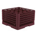 A burgundy full-size plastic glass rack with 16 compartments for holding glasses.