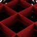 A red square grid with black center and many small squares.