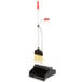 An Unger Ergo angled lobby broom and dust pan with a handle.