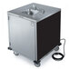 A Lakeside stainless steel portable hand sink on wheels.
