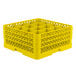 A yellow Vollrath Traex glass rack with 16 compartments.