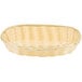 A natural-colored oblong rattan cracker basket.