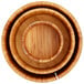 A group of American Metalcraft bamboo risers with circular centers.