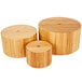 A set of three American Metalcraft round bamboo risers.