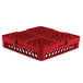 A red plastic Vollrath Traex glass rack with 16 compartments.