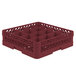 A red plastic Vollrath Traex glass rack with 16 compartments.
