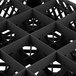 A black plastic Vollrath glass rack with 16 compartments.