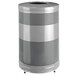 A silver metallic Rubbermaid round steel trash can with a hole in the middle.