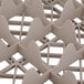A close-up of a beige plastic Vollrath TR8 glass rack.