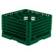A green plastic Vollrath Traex rack with glasses inside.