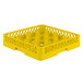 A yellow plastic Vollrath Traex glass rack with 16 compartments.