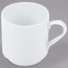 An Arcoroc white coffee mug with a handle.