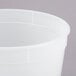 a close-up of a white bucket