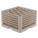 A beige Vollrath Traex glass rack with 20 compartments.