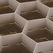 A Vollrath beige plastic glass rack with 20 compartments.