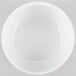 An Arcoroc white bowl on a white background.