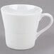 An Arcoroc white coffee mug with a handle.