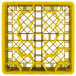 A yellow plastic Vollrath Traex glass rack with hexagons.