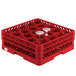 A red Vollrath Traex glass rack with compartments for 20 glasses.