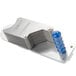 A close-up of the metal pusher assembly with blue plastic on it.
