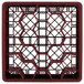 A Vollrath Traex burgundy plastic rack with a grid pattern and hexagonal compartments.