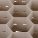 A beige plastic grid for Vollrath Traex glass racks on a white surface.