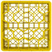 A yellow plastic Vollrath Traex rack with 20 compartments.