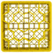 A yellow plastic Vollrath Traex glass rack with hexagons.