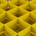 A yellow Vollrath Traex glass rack with square compartments.