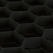 A close up of a black hexagonal grid.