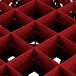 A red square Vollrath glass rack with 25 compartments.