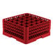 A red plastic Vollrath Traex glass rack with compartments and holes.