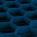A blue plastic container with hexagons for Vollrath TR12HHHHH Traex Glass Rack.