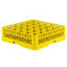 A yellow Vollrath Traex glass rack with 25 compartments.