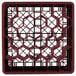 A Vollrath Traex full-size burgundy glass rack with 30 compartments and hexagon shaped holes.