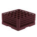 A burgundy plastic Vollrath Traex glass rack with compartments and holes.
