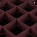 A close up of a plastic grid with square compartments.