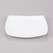 A 10 Strawberry Street Aurora white porcelain square salad/dessert plate with a small rim.