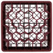 A Vollrath burgundy glass rack with a metal grid.