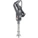 A Robot Coupe grey immersion blender and whisk with a cord.