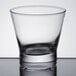 An Arcoroc Shetland rocks glass on a table.