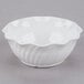 A white Cambro plastic bowl with a wavy edge.